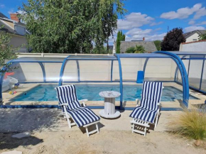 Chambre bleue avec accès plage